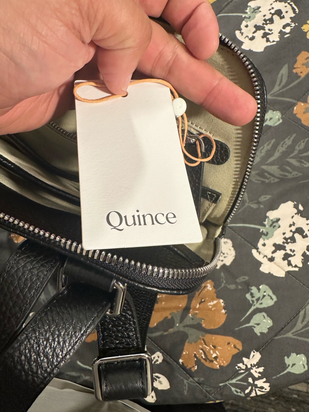 Quince women's Black Leather Crossbody Backpack - Sleek Pebbled Design